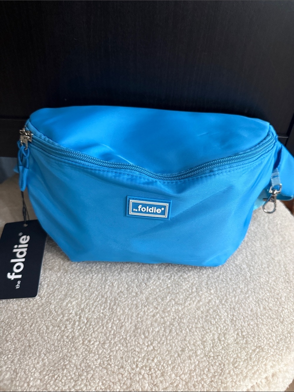the Foldie Bright Blue Foldable Crossbody Waist Bag